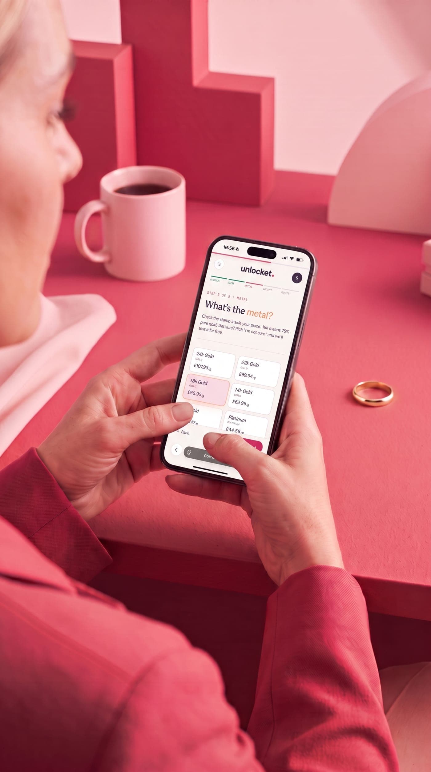 Choosing the metal of a piece in the Unlocket app, with a gold ring on the table